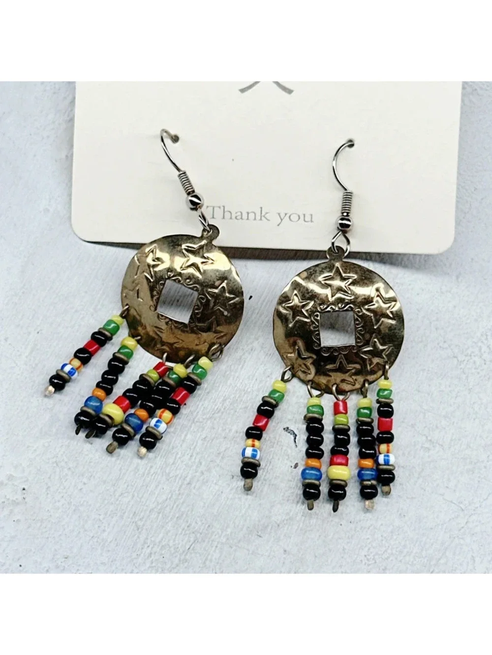 824mc. Goldtone Star Whimsigoth Earrings